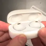 Man holding Vital Earbuds